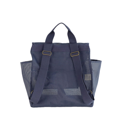 This studio image shows the Sande Beach Hauler mesh backpack in Deep Sea Navy from the rear view. The image highlights the adjustable backpack straps for a customised fit, thick cotton canvas for comfortable carrying, and sturdy mesh material, ensuring durability and practicality for everyday use.