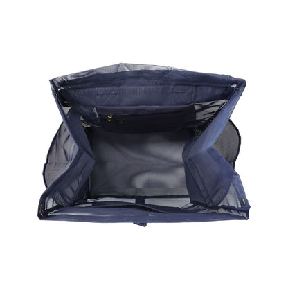 This studio image shows the Sande Beach Hauler mesh backpack in Deep Sea Navy from the top view. It highlights the thick canvas pocket for valuables and a key clip for added security, along with a large mesh pocket to help keep everything organised and easily accessible.