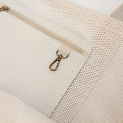 Sande Beach Hauler in Sand. The inside Sand signature feature - a secure canvas pocket and keyclip.