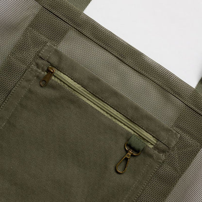 Sande original mesh beach bag in army green, showcasing the internal secure canvas pocket and durable key clip for added functionality and convenience.
