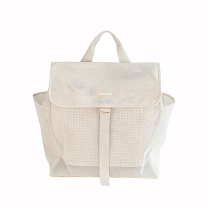 Front view of the Sande Beach Hauler mesh backpack in neutral Sand color, designed for family beach outings.