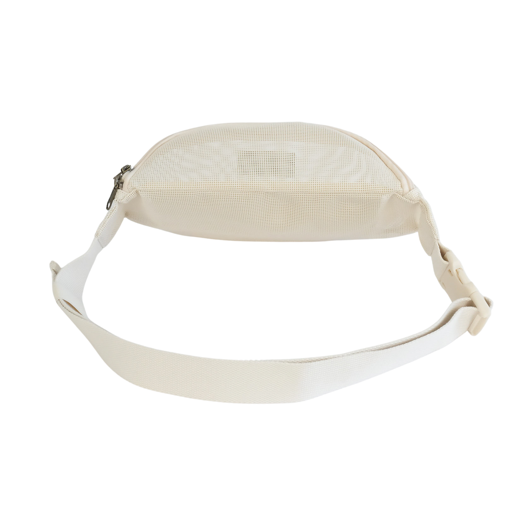 Back view of the Sande Essentials Crossbody Bag in Sand, displayed on a white background, featuring the adjustable strap and secure YKK clip.