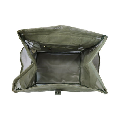 A studio image of the Sande Beach Hauler mesh backpack in Pandanus Green, shown from the top to highlight its practical internal design. This view showcases the internal canvas pocket with a key clip and a large internal mesh pocket, perfect for organising beach essentials. The backpack durable mesh fabric is an ideal choice for beach trips and outdoor adventures. Set against a white background, this functional design ensures convenience.