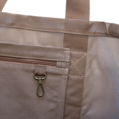 Close-up image of the Sande™ Beach Hauler- Mini mesh bag carry-all in Espresso Brown, showing the durable mesh fabric and internal canvas pocket with key clip for valuables. Ideal for carrying beach essentials on beach days, market trips, and outdoor adventures.