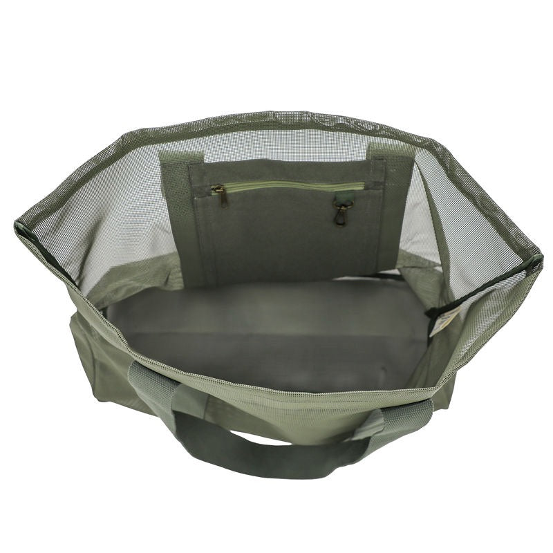 Top view of the Sande Beach Hauler Mini mesh beach bag in Pandanus green on a white background, highlighting spacious interior, functional pockets and practical design.